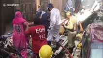 Crews extinguish fire, carry injured from crashed passenger plane wreckage in Karachi