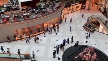 Hong Kong protesters sing anti-China songs in shopping mall