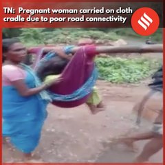 Pregnant woman carried on cloth cradle due to poor road connectivity