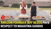 Amazon founder Jeff Bezos pays respect to Mahatma Gandhi after landing in India