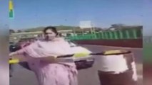 Pakistan Colonel wife abuses Police officer,video goes viral