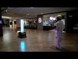 Robot blasts UV light to fight virus in mall
