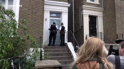 Police officers arrive at home of Dominic Cummings