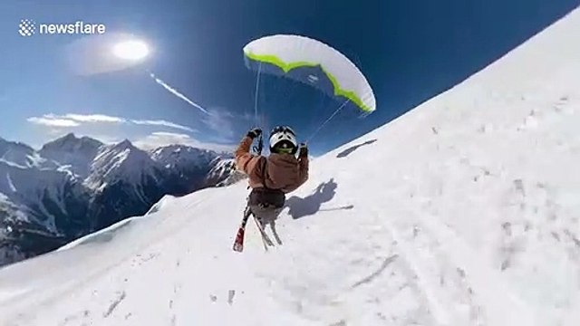 Daredevil flies inches from ground above snowy French Alps