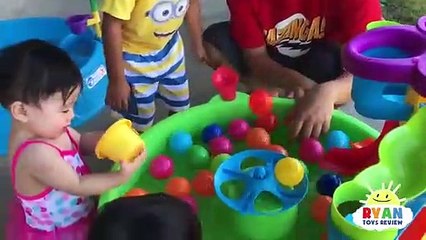 Ryan Plays inflatable water toys with Mommy!