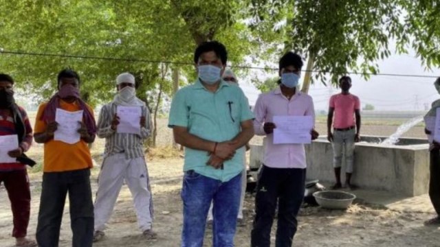 Messiah for migrants: Delhi farmer buys flight tickets for 10 workers