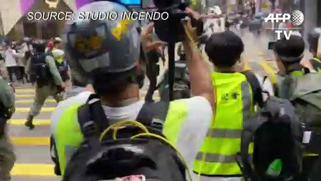 Pepper-ball rounds fired in Hong Kong to stamp out national anthem protests