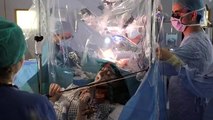This is the moment a musician played the violin -- while surgeons removed a tumour from her brain-