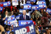 Biden secures Democratic presidential nomination for November showdown against Trump
