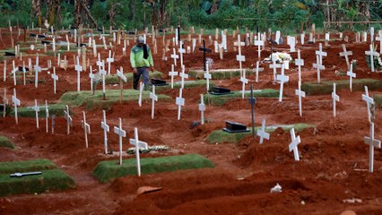 Indonesia coronavirus death toll may be higher than reported, burial numbers indicate