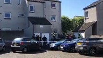 Police on the scene where a man has died following an incident in the west of Edinburgh