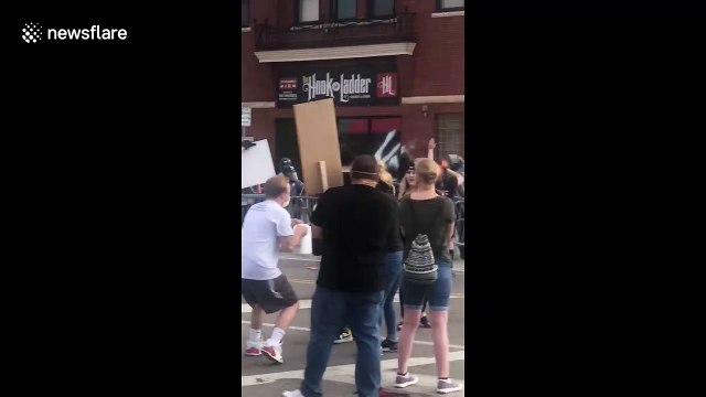 Police try to take charge at Minneapolis precinct during protests against George Floyd's killing