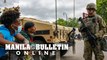 US: National Guard deployed to Minneapolis stand guard after violent protests overnight