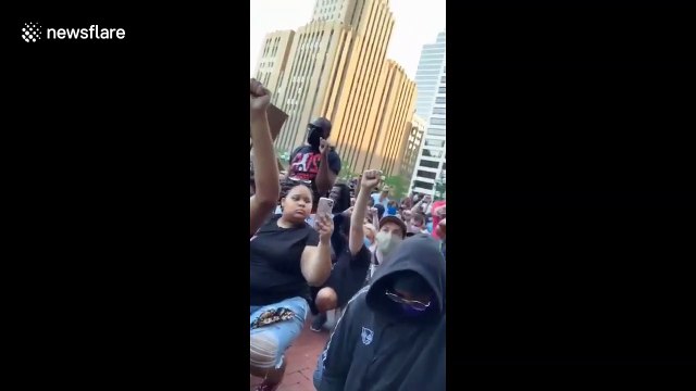 Protesters gather outside Minneapolis City Hall to voice anger at death of George Floyd