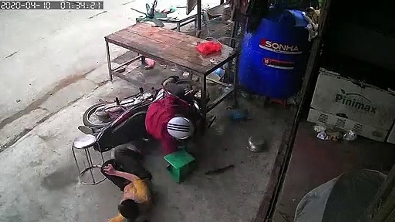 Motorcyclist Runs into Butcher Table in Close Call
