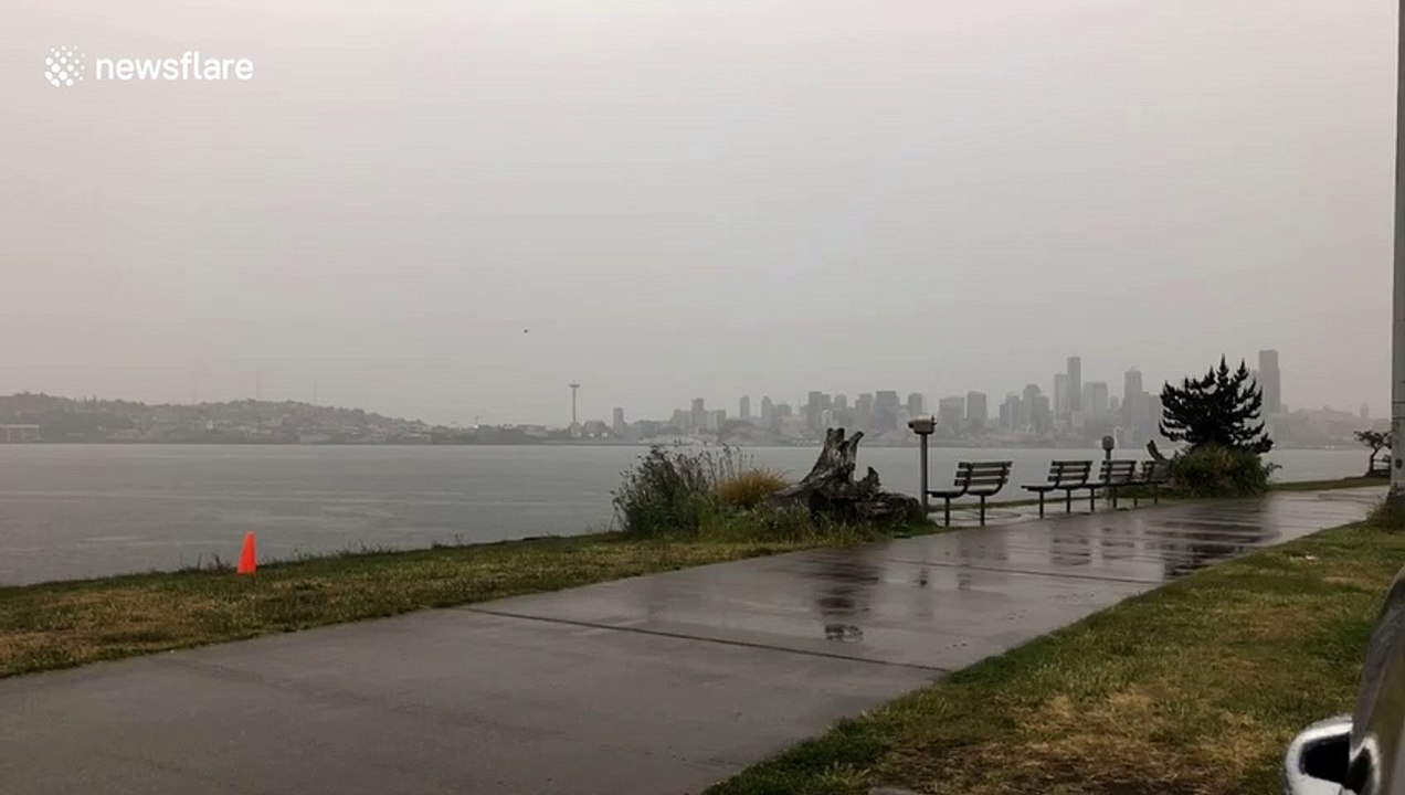 Amazing footage as two lightning bolts strike Seattle simultaneously across Puget Sound