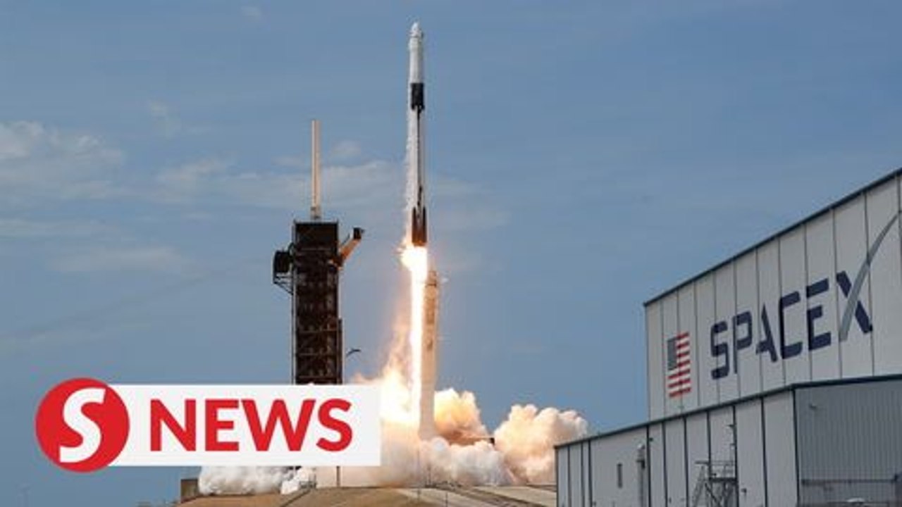 SpaceX launches two Nasa astronauts into orbit in historic mission