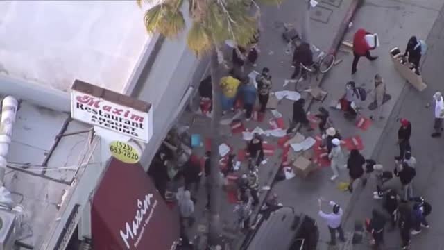 El pillaje y el vandalismo se unen a los disturbios raciales en EEUU