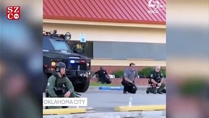 Polis protestocular karşısında diz çöktü