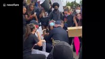 Heartfelt moment Oakley Police Chief hugs crying protestor in California