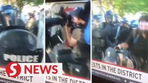 Australian cameraman struck by police at Washington D.C. protest