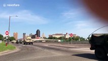 Large convoy of National Guard vehicles seen driving towards Minneapolis