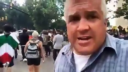 USA: FLOYD -  POLICE  - Protesters overturn and vandalize a Salt Lake City Police Department patrol vehicle.