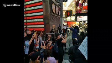 'Take a knee' Officer in New York takes a knee with protestor while crowd cheers