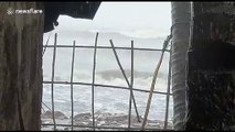 Huge waves whipped up as Cyclone Nisarg strikes western India