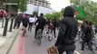 Black Lives Matter protesters throw water bottles at police during London march