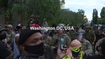 Police watch over crowd of protesters outside White House