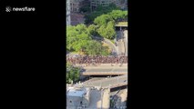 Incredible view of MASS of packed protesters crossing the Brooklyn Bridge into Manhattan