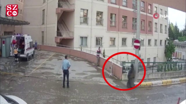 Test sonucunun pozitif olduğunu bilmesine rağmen boynundaki atkıyı hastane girişindeki duvara böyle bırakmış