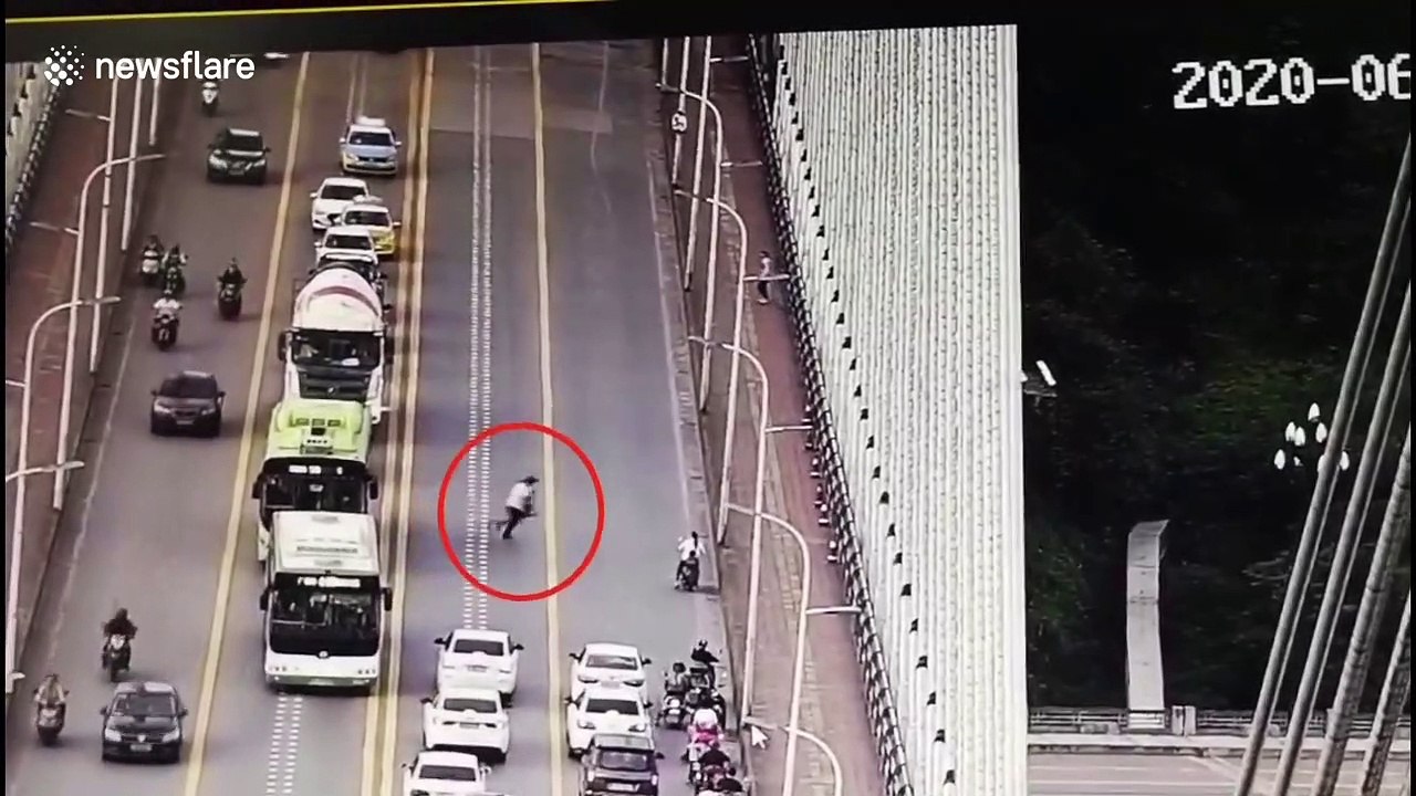 Five-year-old rides scooter on busy road in China