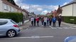 Friends of teenager Benji Catchpole line the road in tribute on the day of his funeral