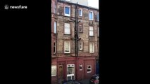 Fearless Scottish man scales building to get into second-floor window