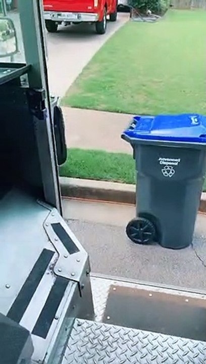 FedEx Worker Going the Extra Mile on Trash Day