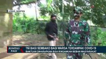 Bantu Warga Terdampak Corona, Personel TNI Bagikan Bantuan Sembako