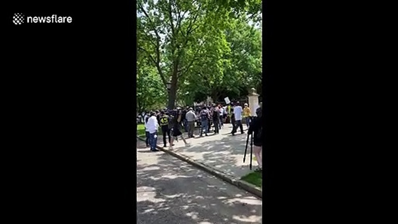Families of police brutality victims speak to protestors in front of Minneapolis governor's mansion