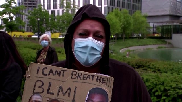 Protesters topple statue of slave trader in the UK