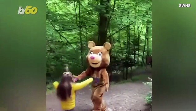 Heroic Paramedic Reunites with Her Twins in Bear Costume After Three Months Apart