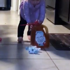 Baby Who Just Wants Apple Juice Surprised by Playful Kitty