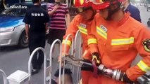 Firefighters free Chinese man's head from guardrails