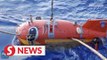 China's unmanned submersible sets new record of 10,907m under sea