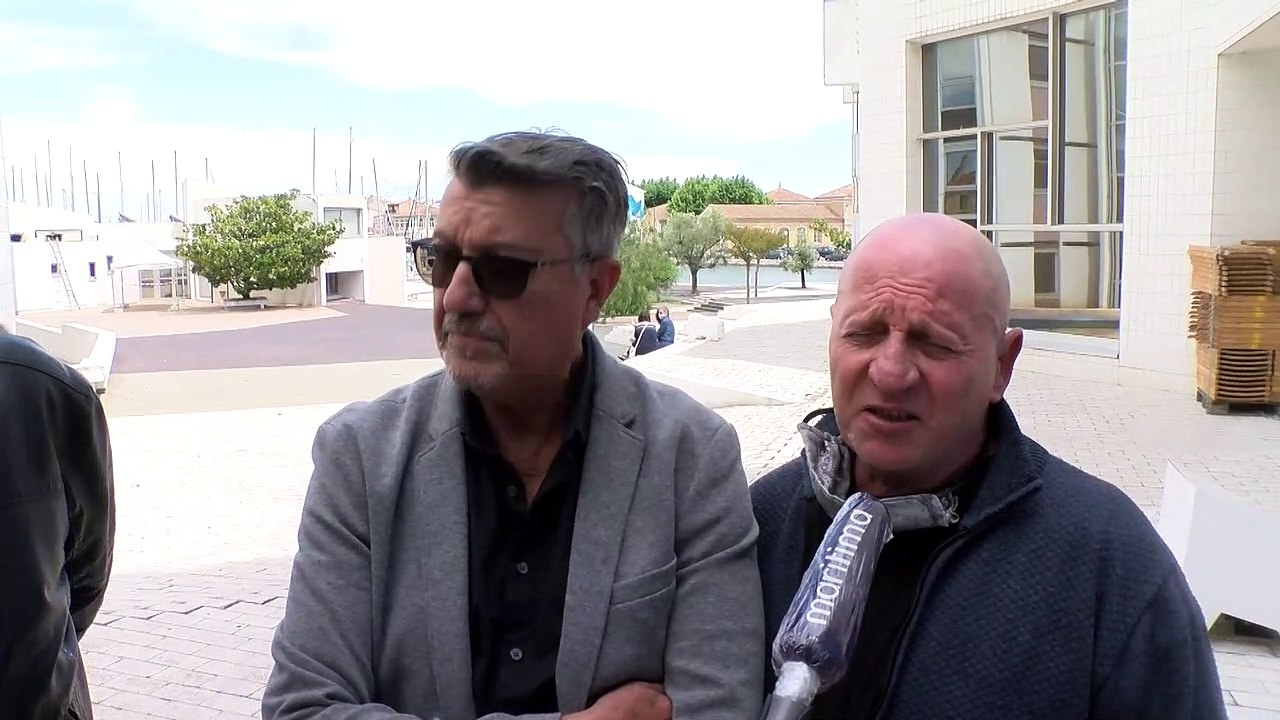 Un employé et deux anciens employés des services municipaux.