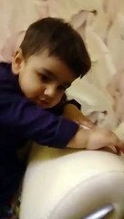 Baby shy away from camera