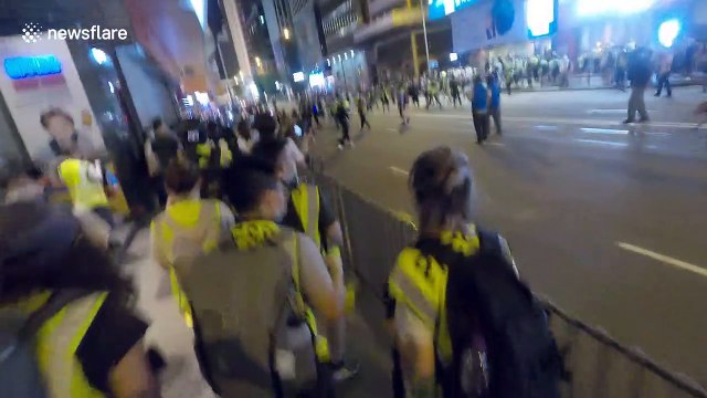 Protesters and journalists shot with pepper balls at point blank range in Hong Kong