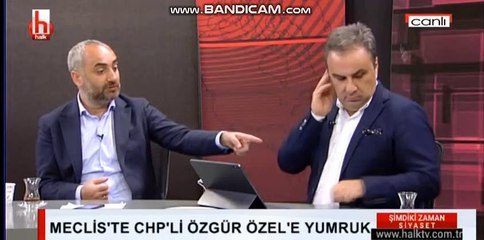 CHP'li Özel'e MHP'li milletvekilinden yumruklu saldırı