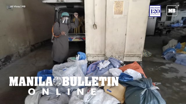 Worker disinfects the letters and parcels at Philippine Postal Office in Manila