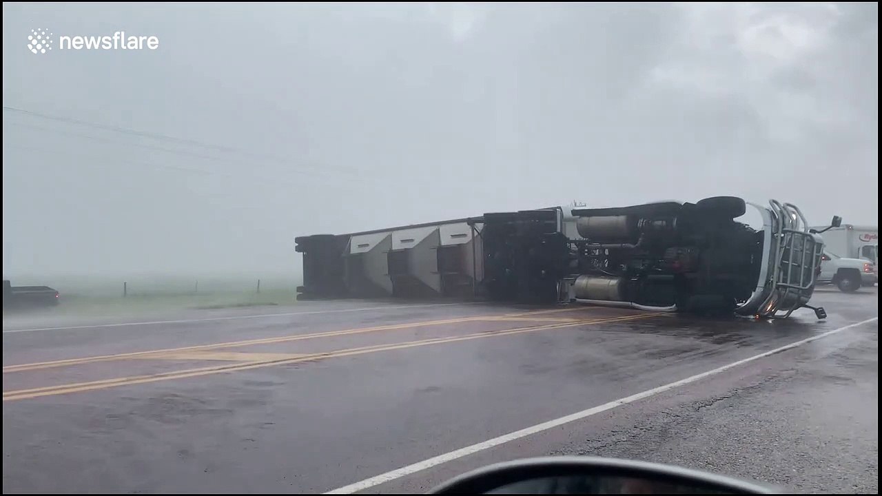 Crashed Semi flipped on its side blocks South Dakota Interstate